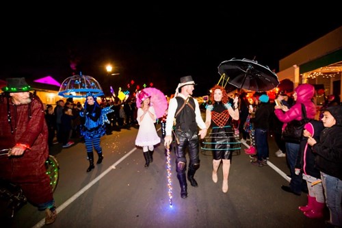 People in costume walking down the street