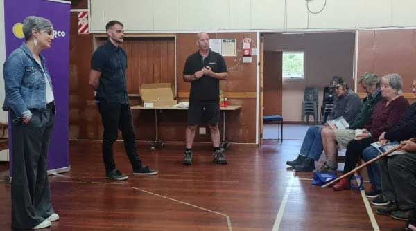 Powerco staff attending a community meeting in Tīnui town hall